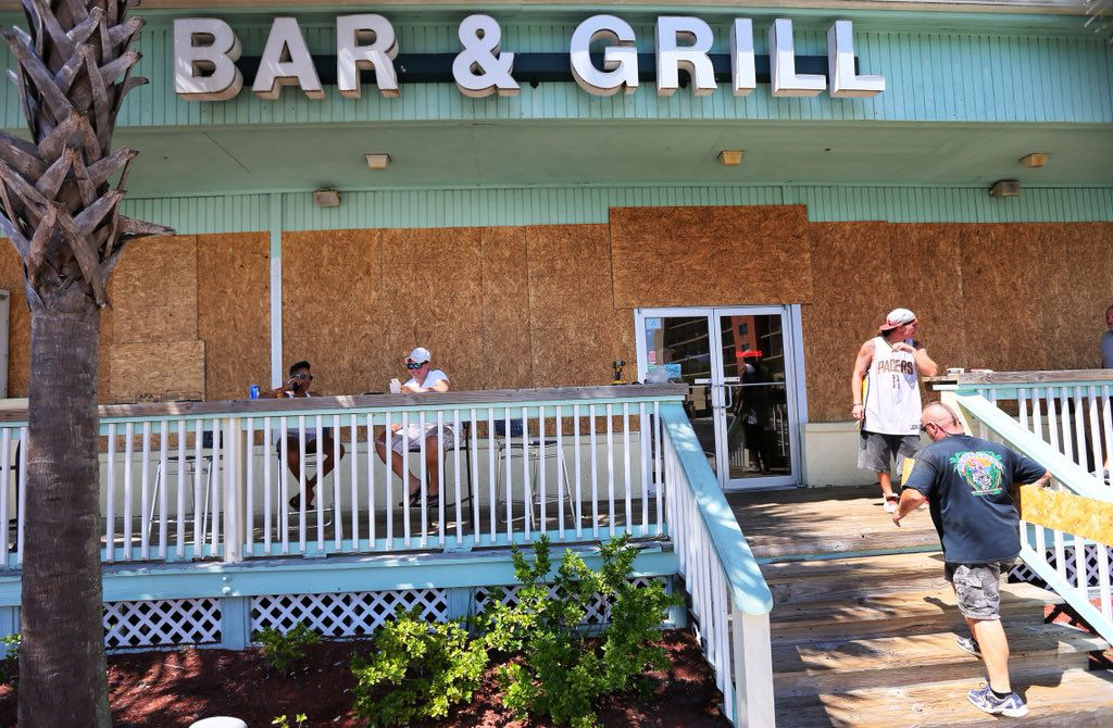 Surfside Beach bar and grill boarded up